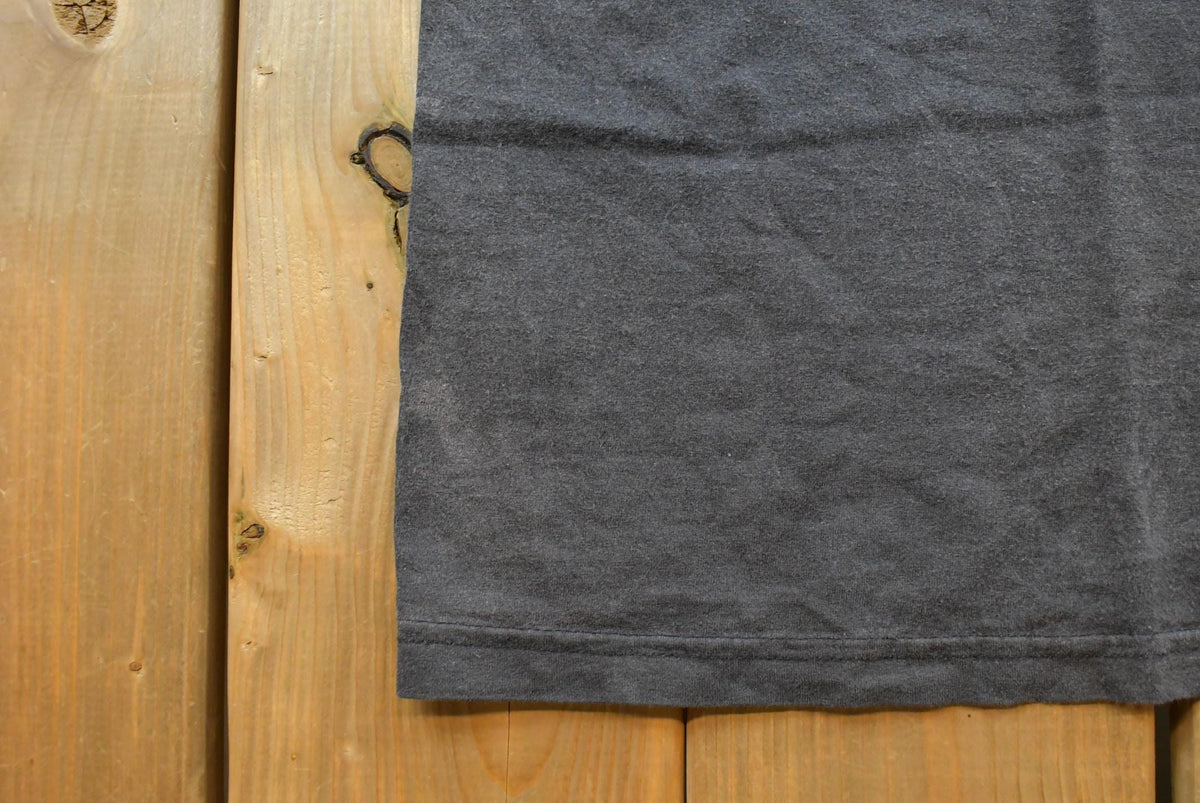 Vintage 1990s Faded Blank Black Pocket T-Shirt Men's L from propervintagecanada