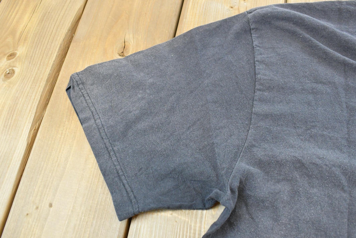 Vintage 1990s Faded Blank Black Pocket T-Shirt Men's L from propervintagecanada
