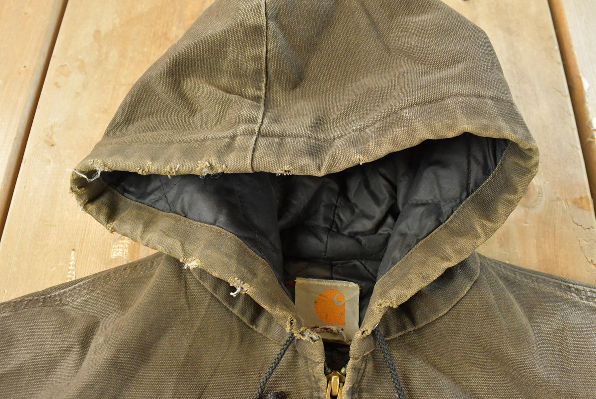 Vintage 1990s Faded Distressed Carhartt Hooded Active Work Jacket Men's XL / Workwear / 90s Streetwear / Outerwear from propervintagecanada