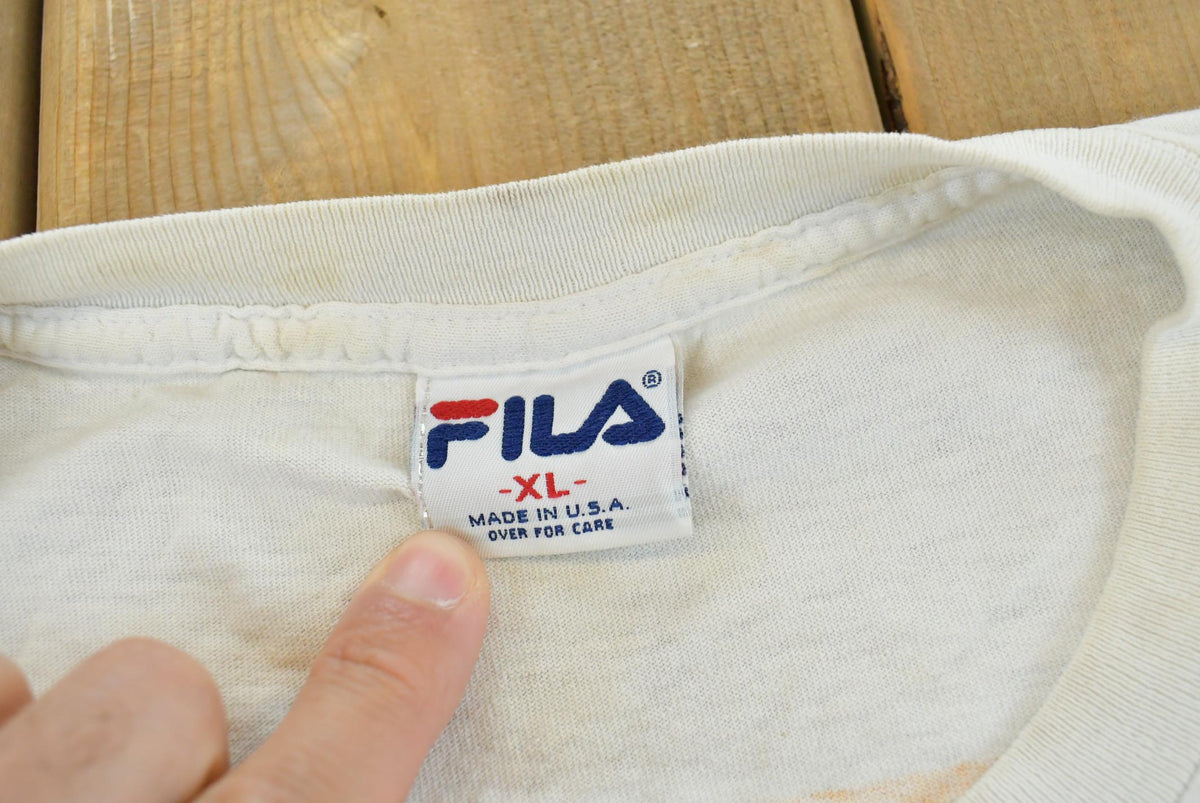 Vintage 1990s Fila Logo Graphic T-Shirt Men's 2XL from propervintagecanada