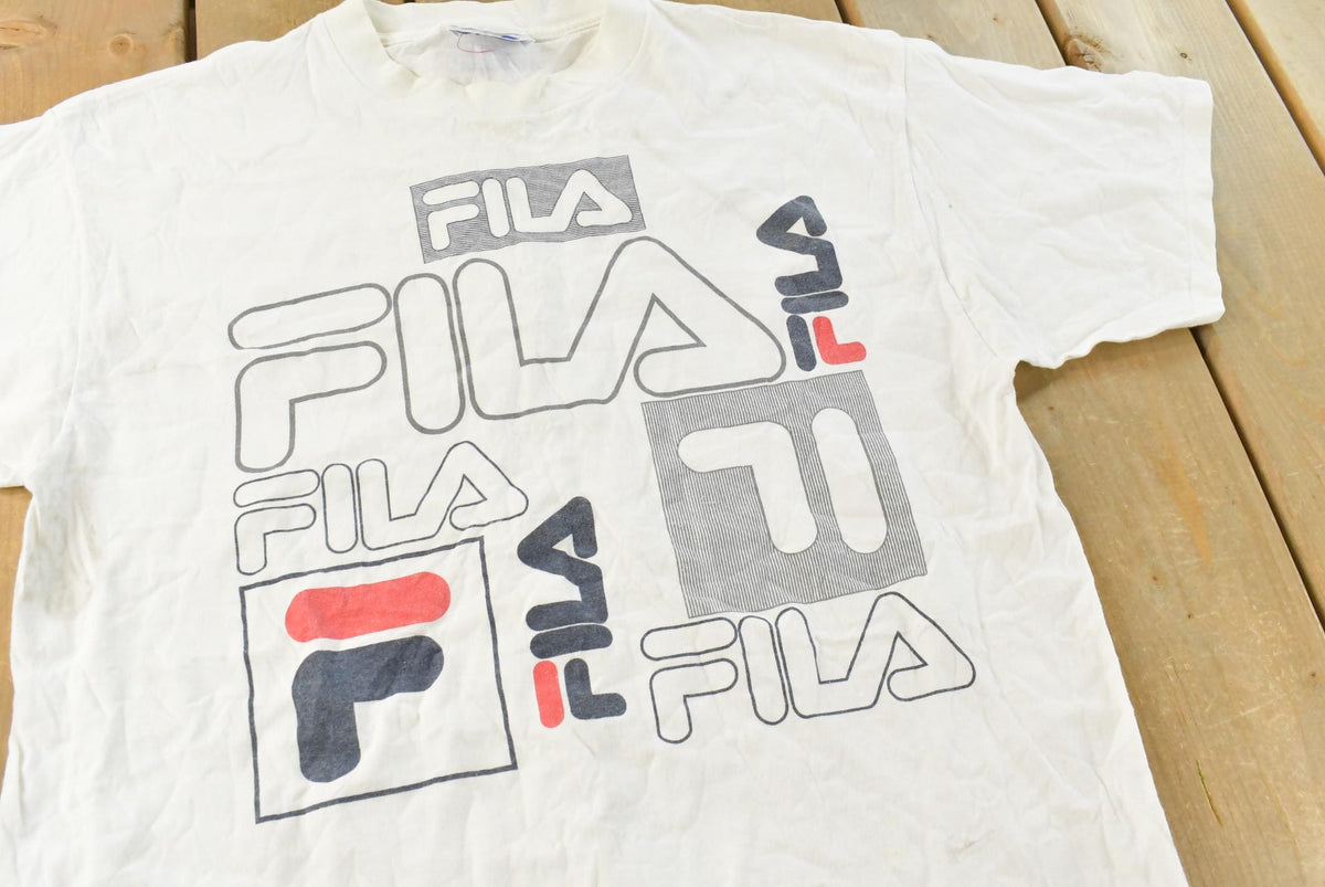 Vintage 1990s Fila Logo Graphic T-Shirt Men's L from propervintagecanada