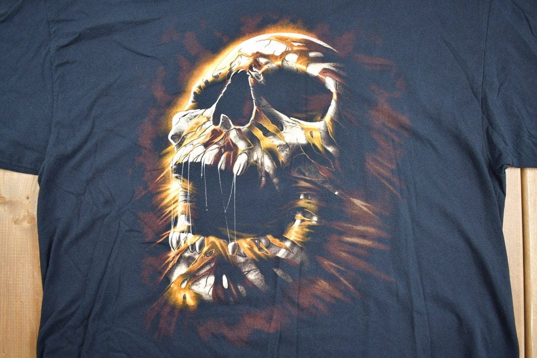 Vintage 1990s Flaming Skull Graphic T-Shirt Men's XL from propervintagecanada