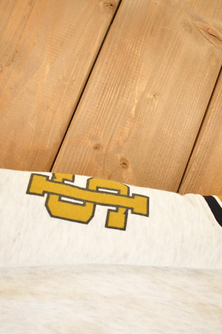Vintage 1990s Fleece Tech St Ignace Saints University Tie Up Crewneck Sweater Men's XL from propervintagecanada