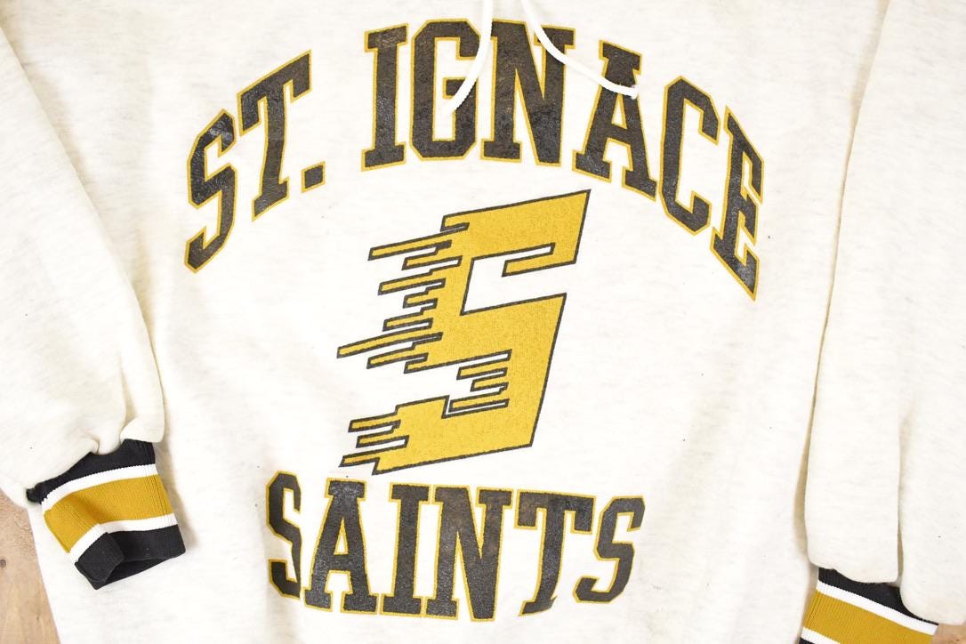 Vintage 1990s Fleece Tech St Ignace Saints University Tie Up Crewneck Sweater Men's XL from propervintagecanada