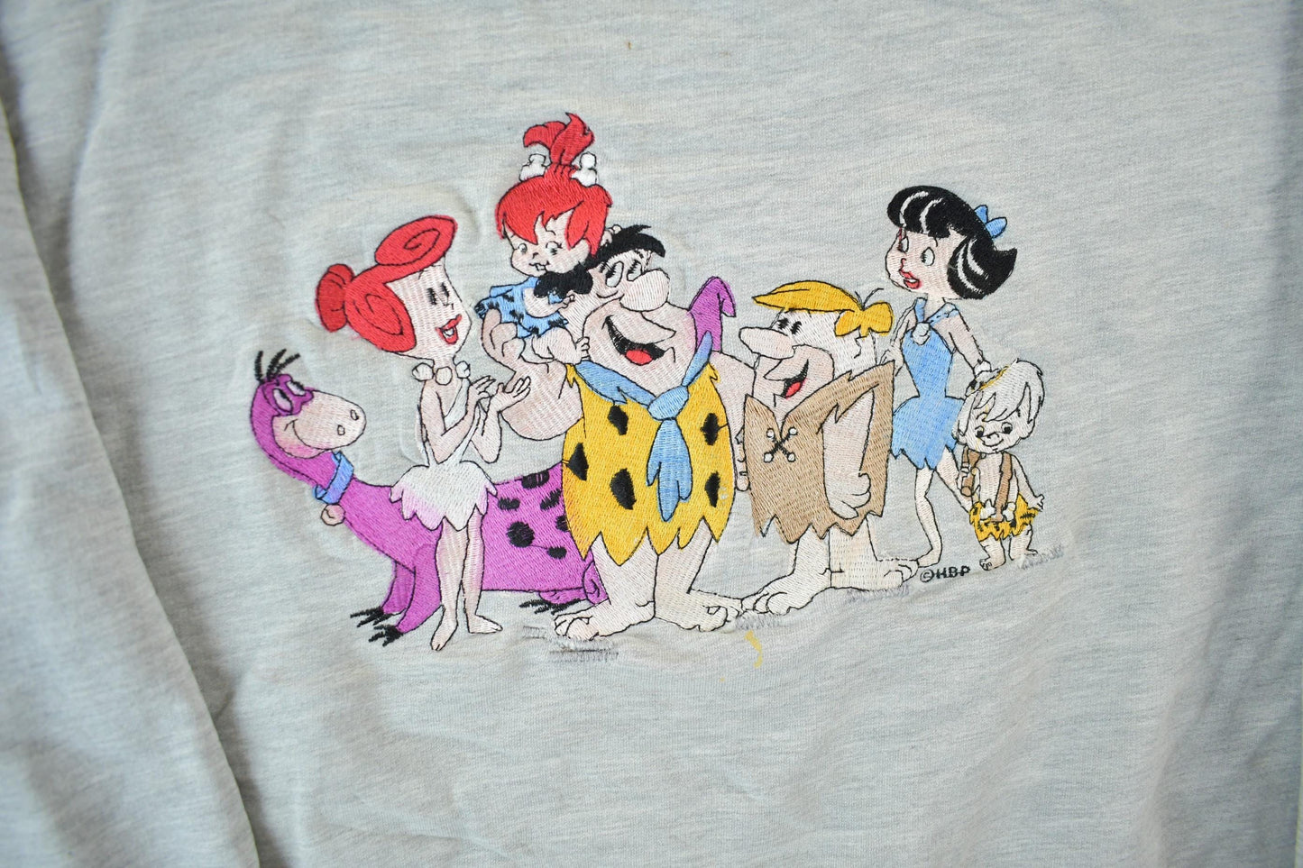Vintage 1990s Flintstones Universal Studios Crewneck Sweatshirt Men's Large from propervintagecanada