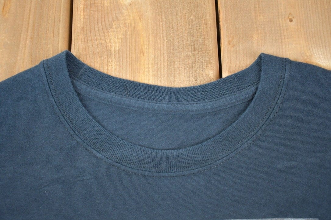 Vintage 1990s Ford Built Graphic T-Shirt Men's XL from propervintagecanada