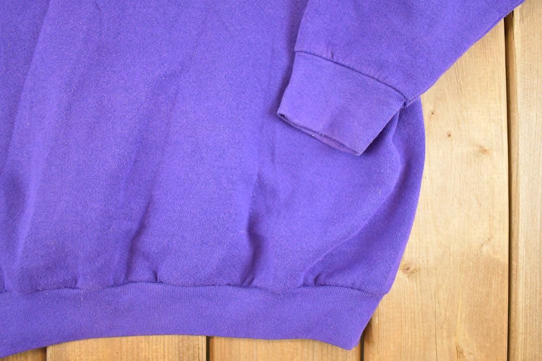 Vintage 1990s FOTL Blank Purple Souvenir Crewneck Sweatshirt Men's XL from propervintagecanada