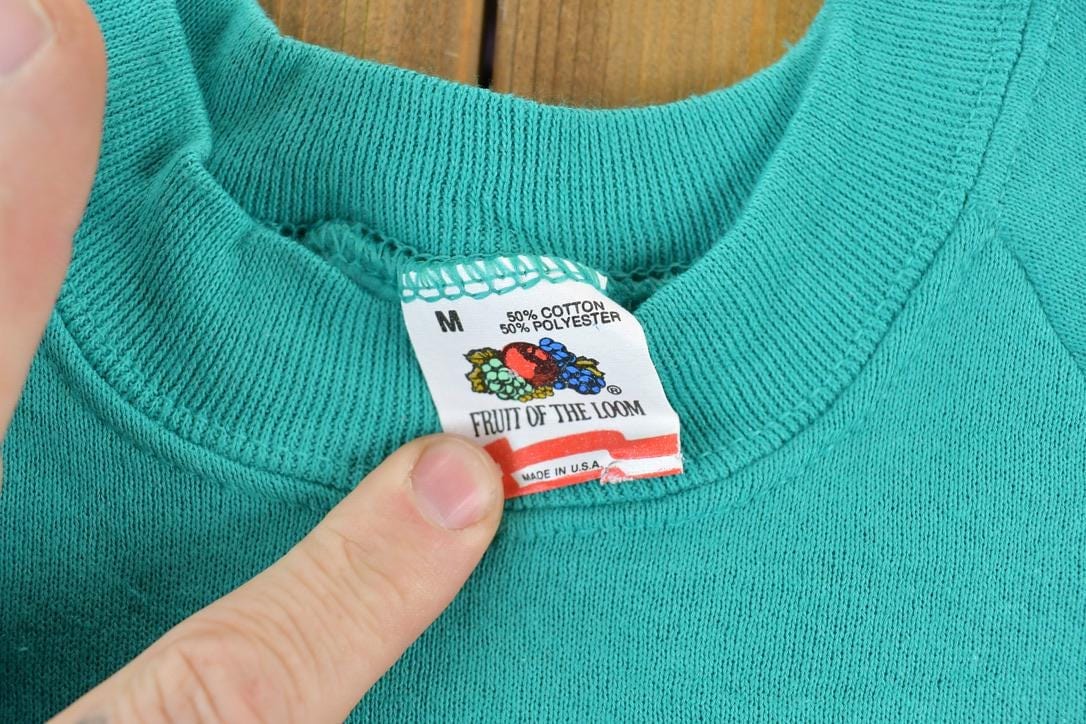 Vintage 1990s FOTL Blank Teal Crewneck Sweatshirt Men's Medium from propervintagecanada