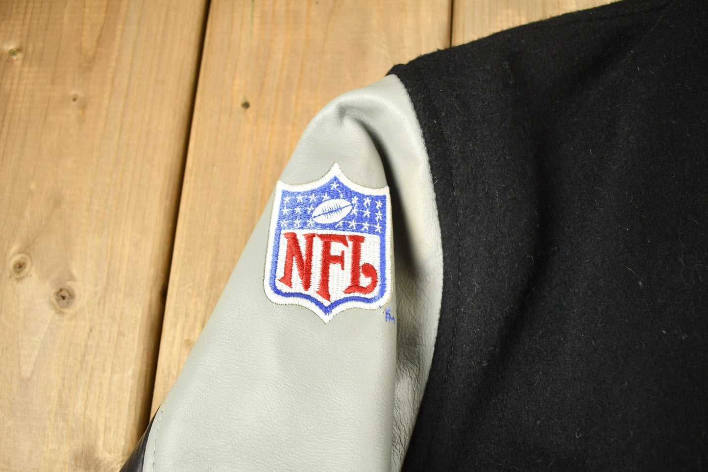 Vintage 1990s FOX NFL Sunday Garth Brooks Leather Varsity Jacket Men's XL from propervintagecanada