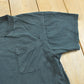 Vintage 1990s Fruit of the Loom Black Blank Pocket T-Shirt Men's M from propervintagecanada