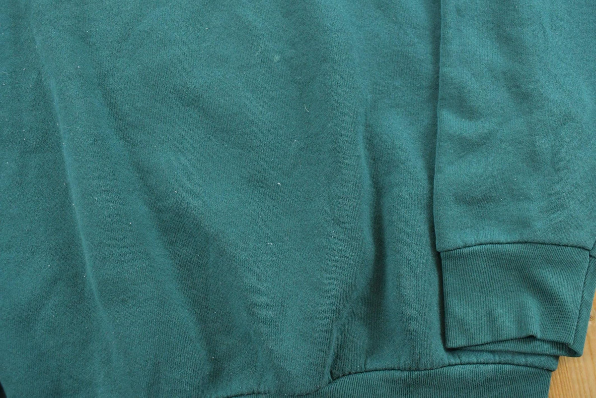 Vintage 1990s Fruit of the Loom Blank Green Crewneck Sweatshirt Men's M from propervintagecanada
