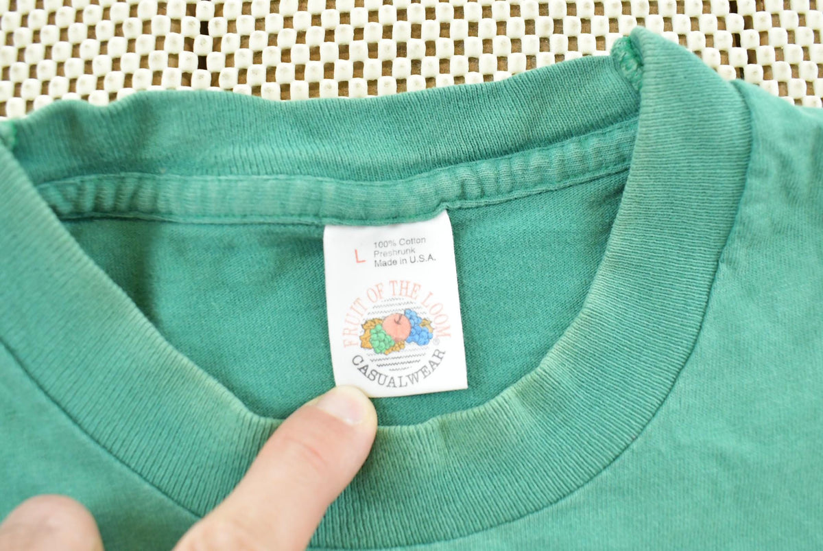 Vintage 1990s Fruit of the Loom Blank Green Pocket T-Shirt Men's L from propervintagecanada