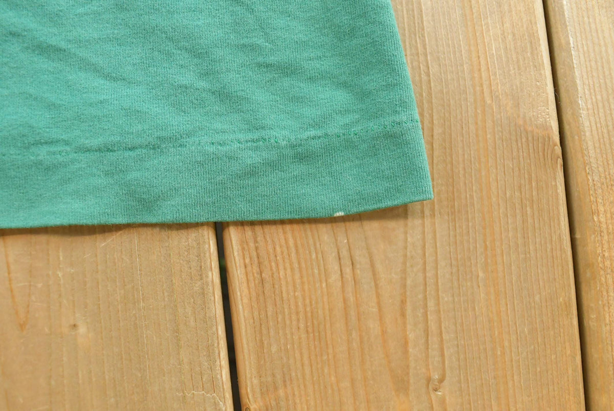 Vintage 1990s Fruit of the Loom Blank Green Pocket T-Shirt Men's L from propervintagecanada