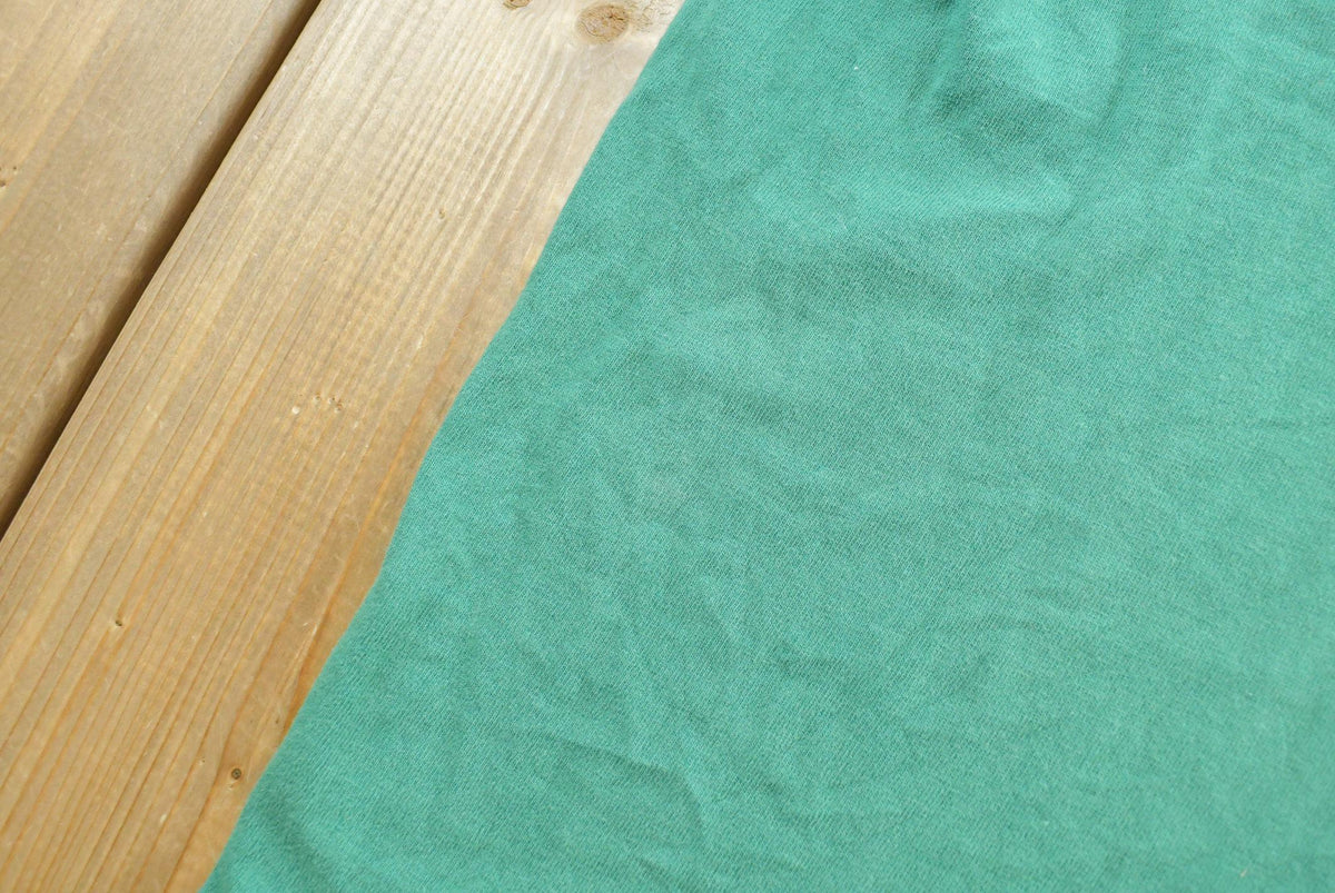 Vintage 1990s Fruit of the Loom Blank Green Pocket T-Shirt Men's L from propervintagecanada