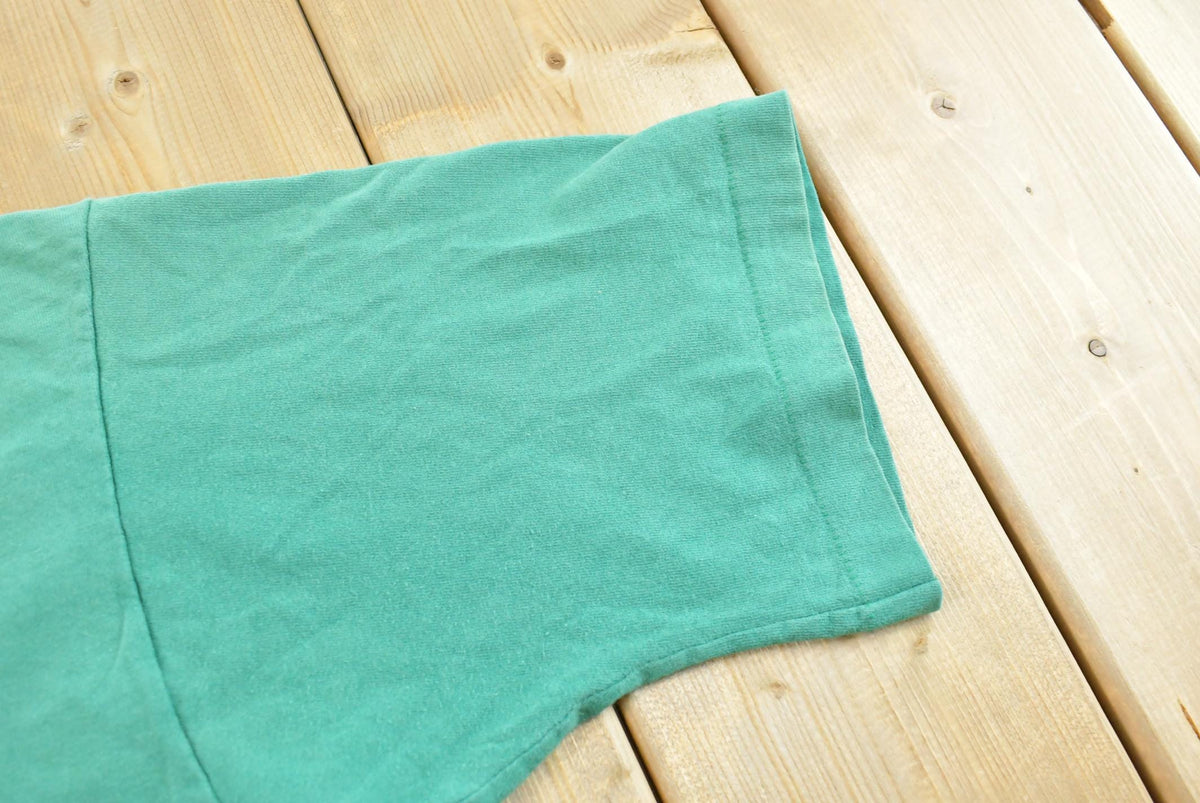 Vintage 1990s Fruit of the Loom Blank Green Pocket T-Shirt Men's L from propervintagecanada