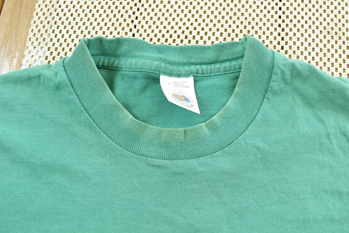 Vintage 1990s Fruit of the Loom Blank Green Pocket T-Shirt Men's L from propervintagecanada