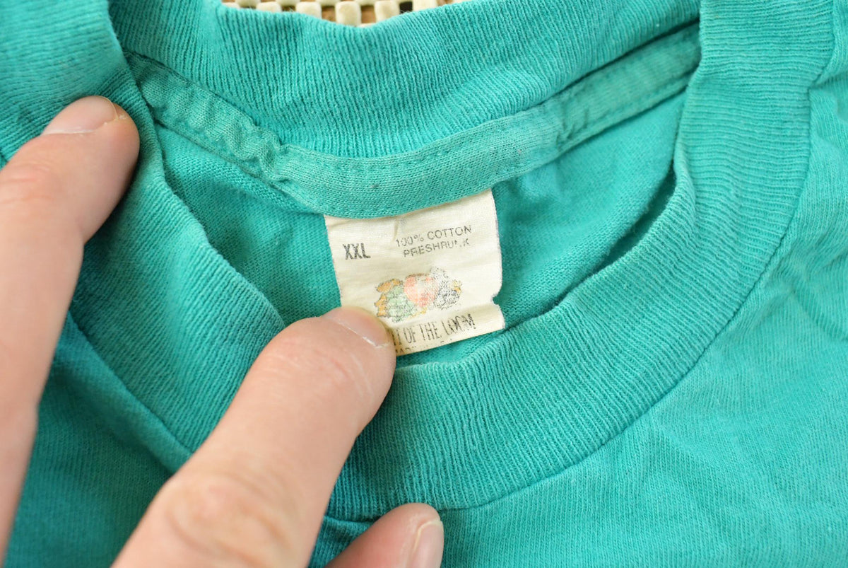 Vintage 1990s Fruit of the Loom Blank Teal Pocket T-Shirt Men's L from propervintagecanada