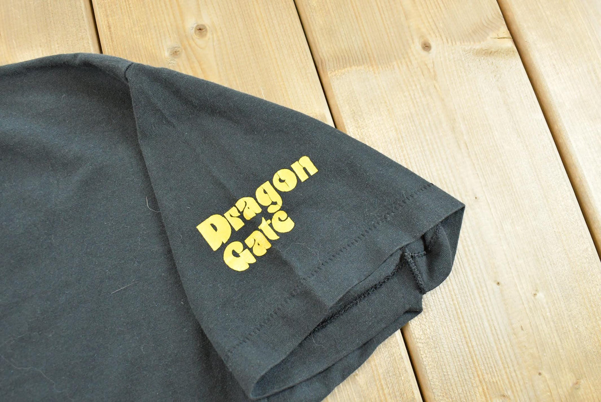 Vintage 1990s Fruit of the Loom Dragon Gate Souvenir T-Shirt Men's XL from propervintagecanada