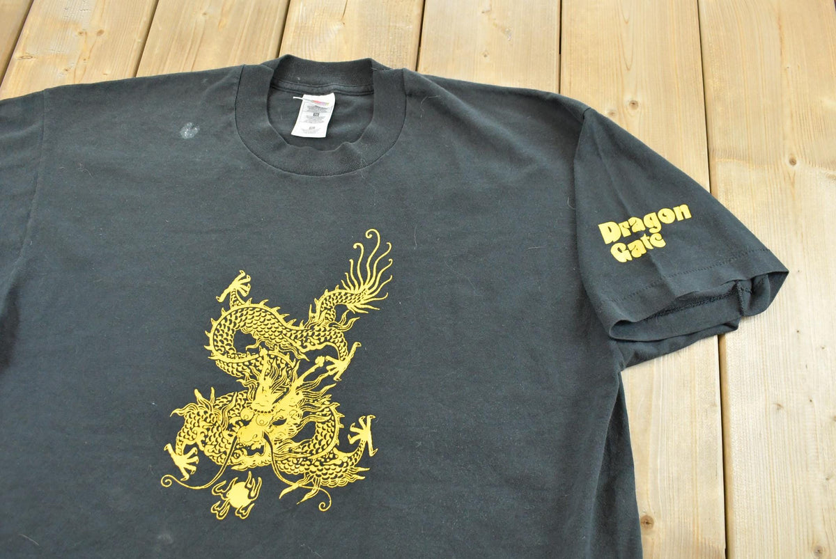 Vintage 1990s Fruit of the Loom Dragon Gate Souvenir T-Shirt Men's XL from propervintagecanada