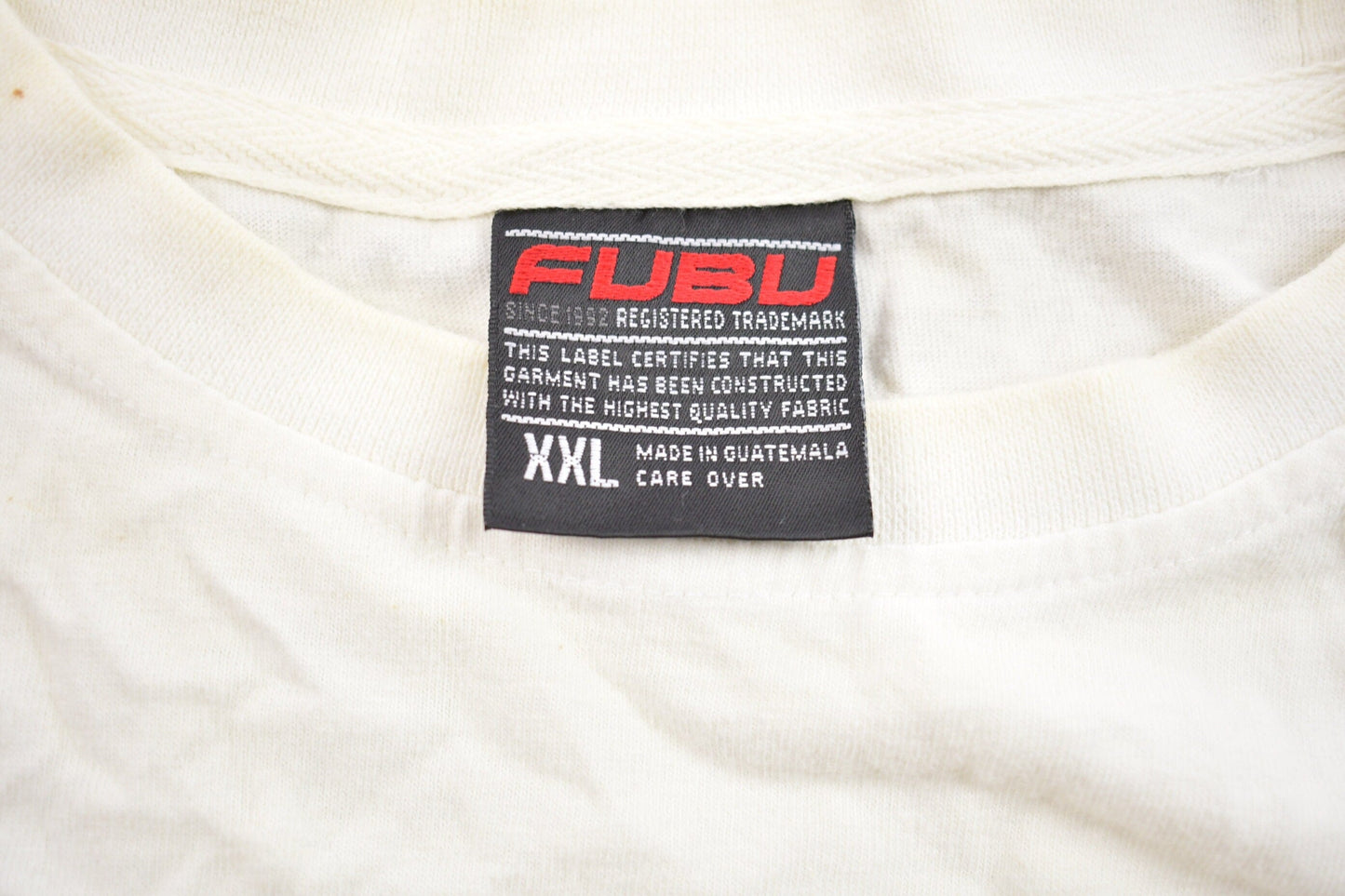 Vintage 1990s FUBU.CO.XC11 Fuzzy Embroidered Lettering T-Shirt Men's 3XL from propervintagecanada