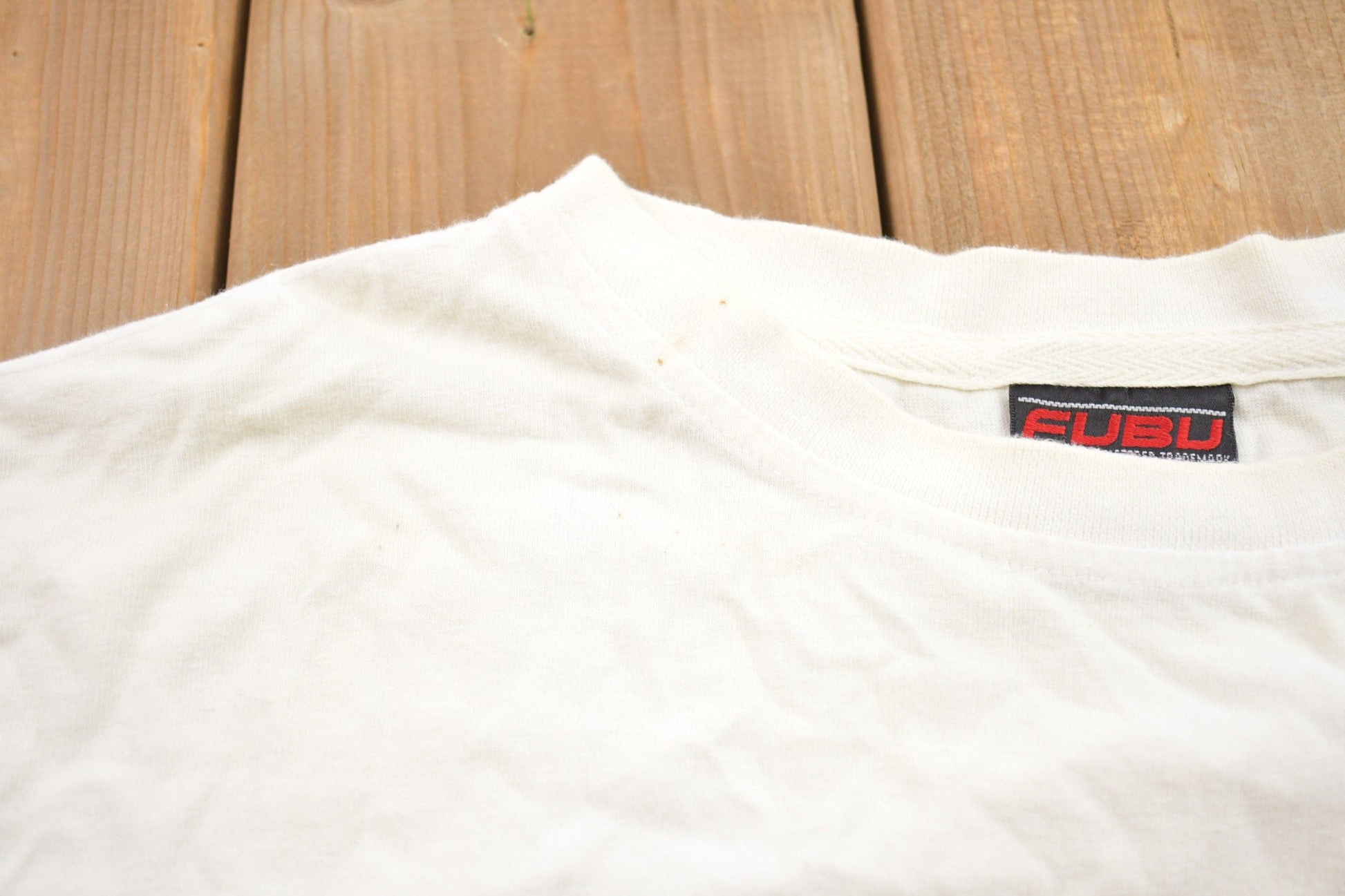 Vintage 1990s FUBU.CO.XC11 Fuzzy Embroidered Lettering T-Shirt Men's 3XL from propervintagecanada
