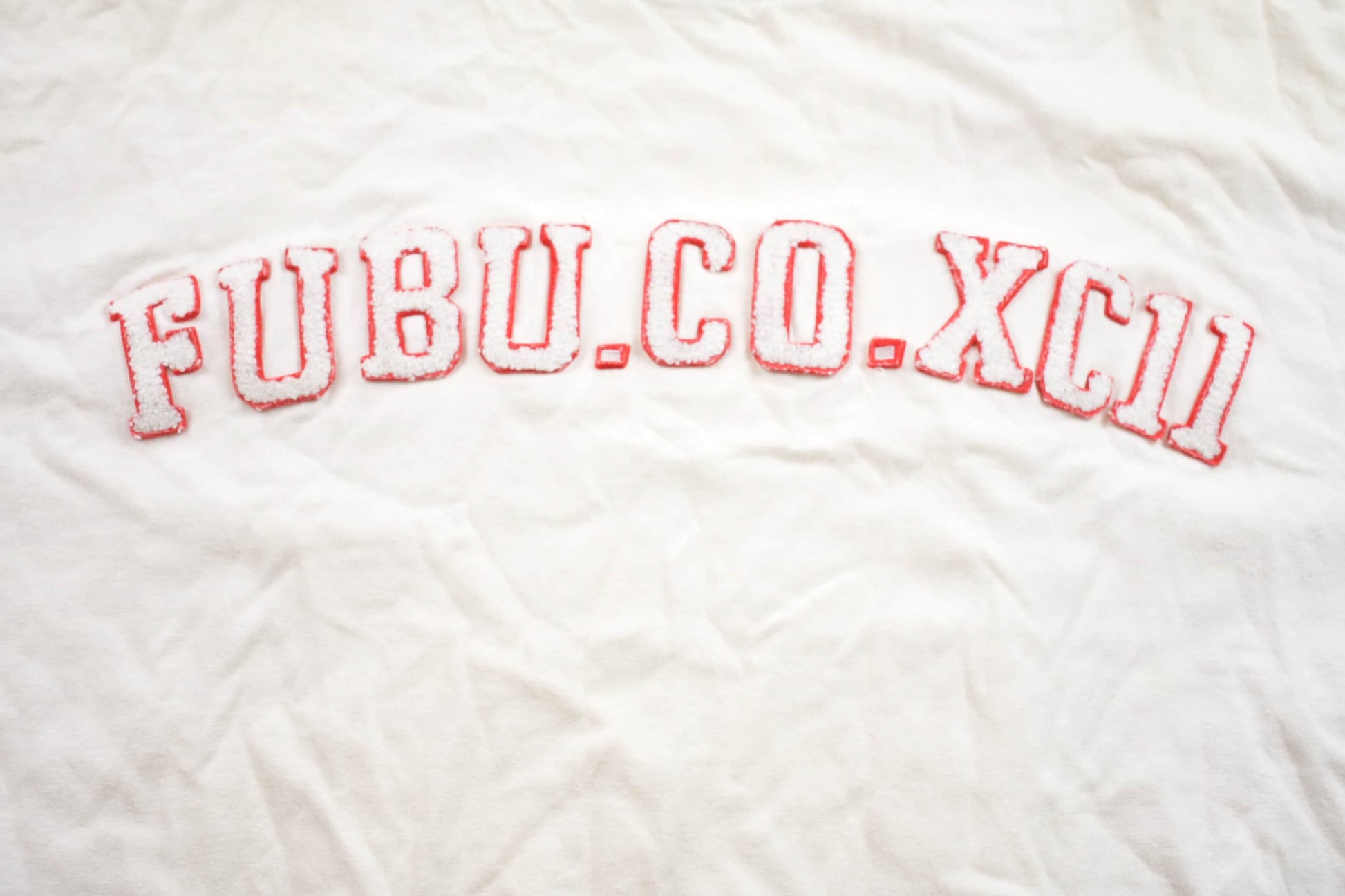 Vintage 1990s FUBU.CO.XC11 Fuzzy Embroidered Lettering T-Shirt Men's 3XL from propervintagecanada