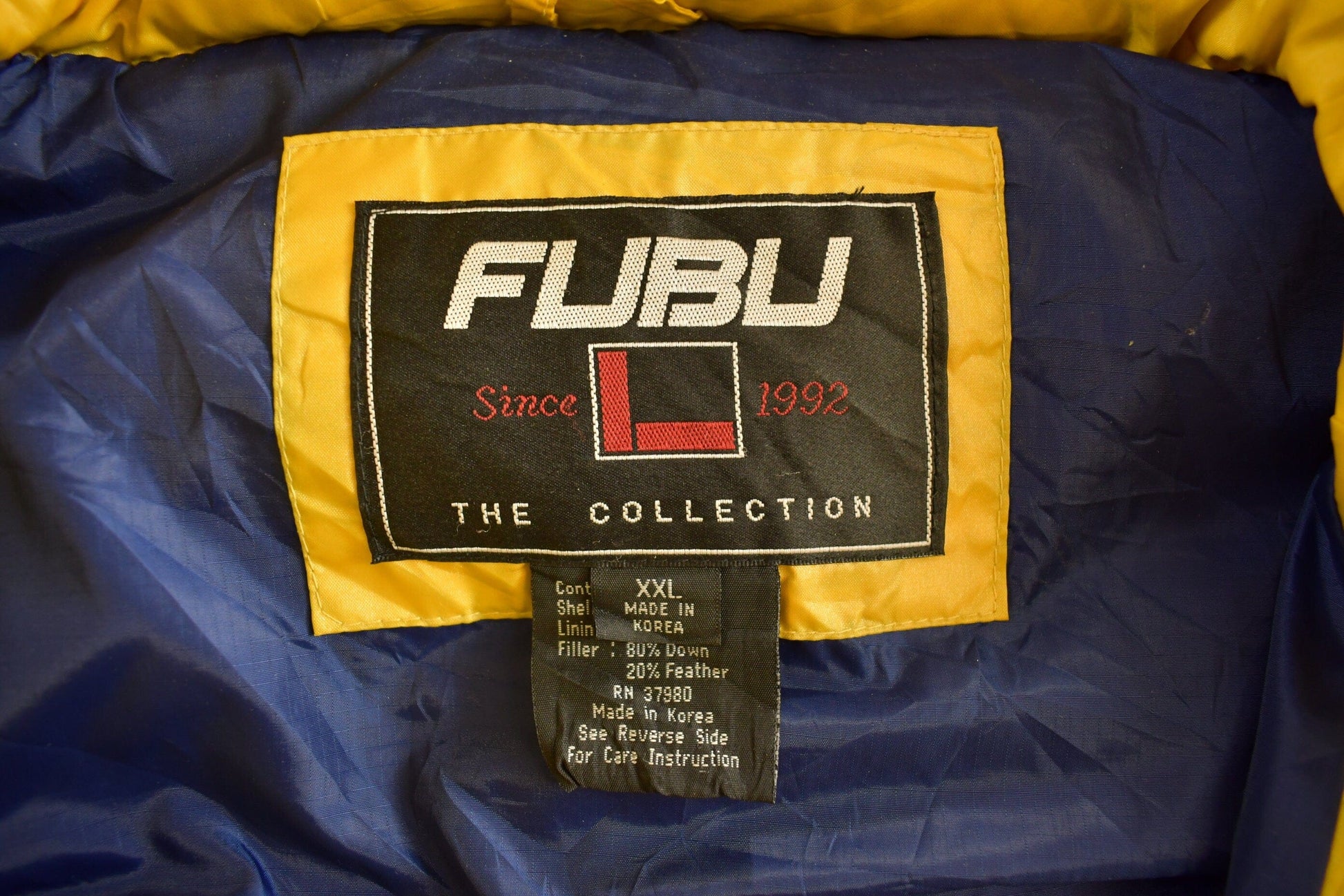 Vintage 1990s Fubu Jeans Puffer Vest Men's 2XL from propervintagecanada