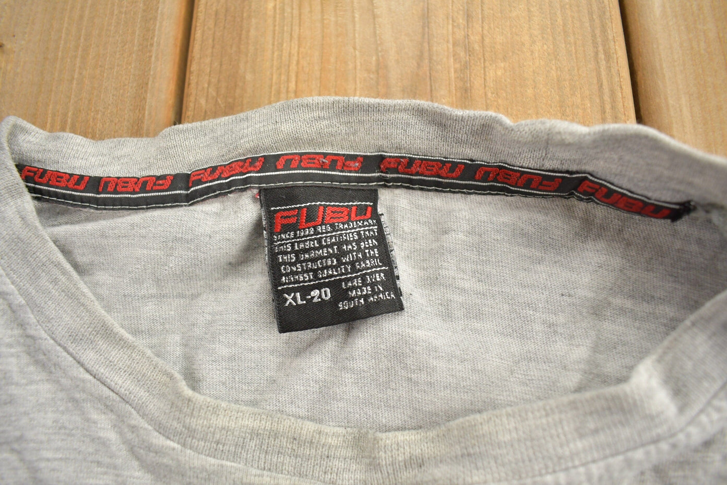 Vintage 1990s FUBU Sports Graphic Long Sleeve Shirt from propervintagecanada