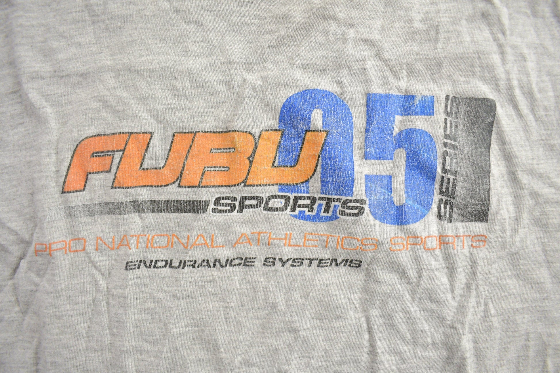 Vintage 1990s FUBU Sports Graphic Long Sleeve Shirt from propervintagecanada