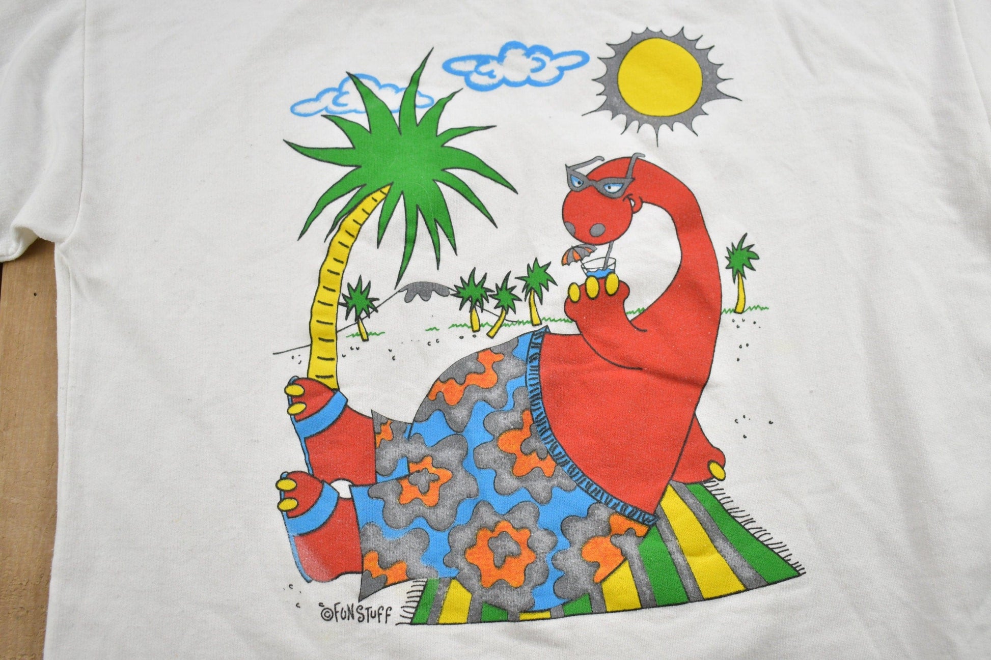 Vintage 1990s Fun Stuff NY Dinosaur Theme Crewneck Short Sleeve Sweatshirt Men's Large from propervintagecanada
