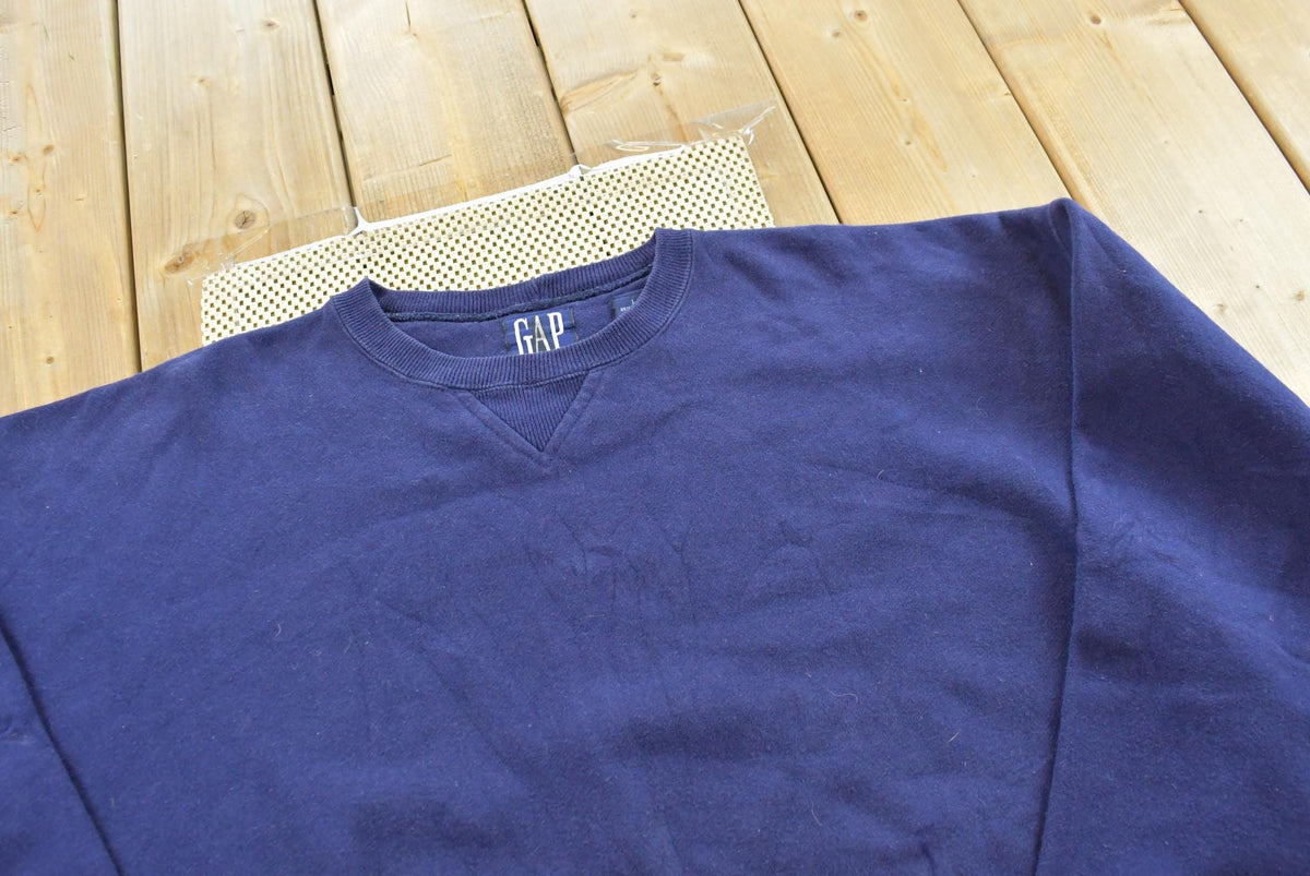 Vintage 1990s GAP Blank Blue Crewneck Sweatshirt Men's XL from propervintagecanada