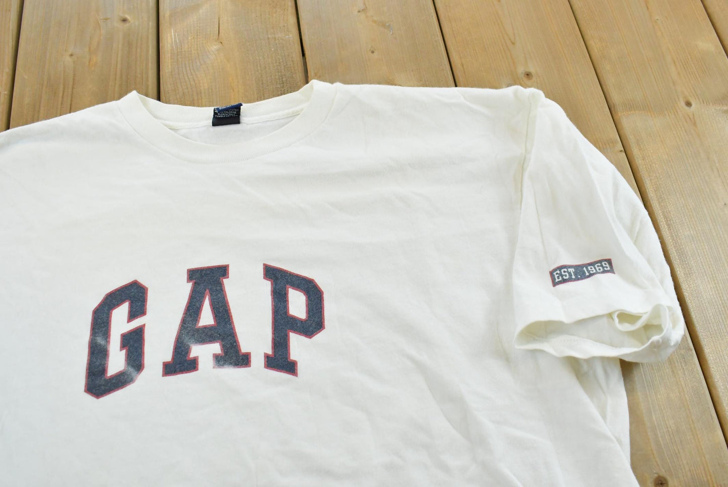 Vintage 1990s Gap Logo Spellout T-Shirt Men's L from propervintagecanada