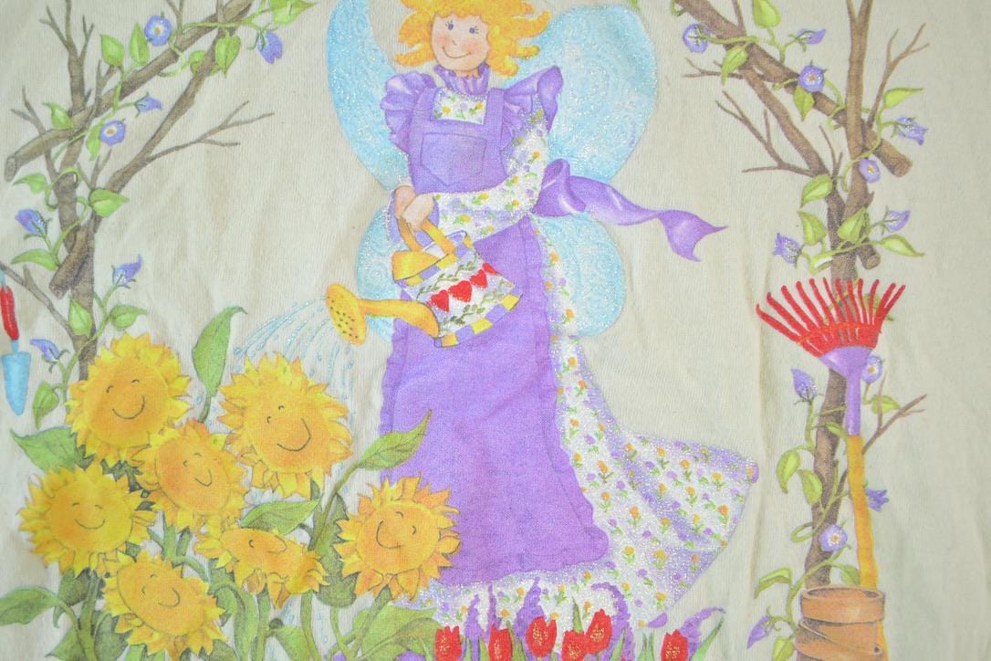 Vintage 1990s Garden Lady Atlas Angel Souvenir Single Stitch Graphic Print T-Shirt Men's XL from propervintagecanada