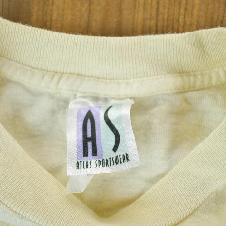 Vintage 1990s Garden Lady Atlas Angel Souvenir Single Stitch Graphic Print T-Shirt Men's XL from propervintagecanada