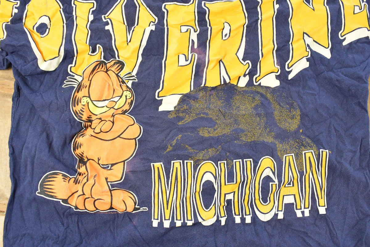 Vintage 1990s Garfield Michigan Wolverines Collegiate T-Shirt Men's L from propervintagecanada