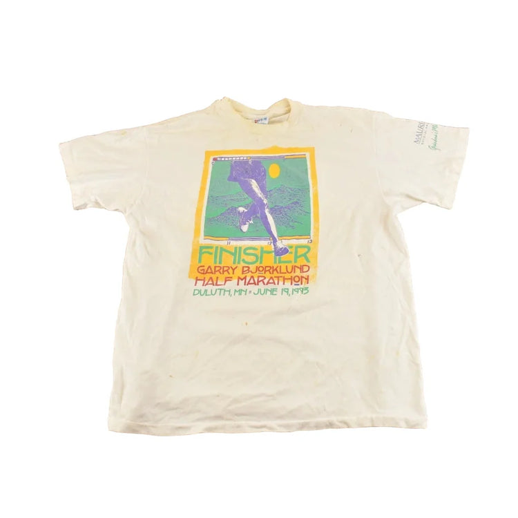Vintage 1990s Garry Bjorklund Half Marathon Finisher Graphic T-Shirt Men's M from propervintagecanada