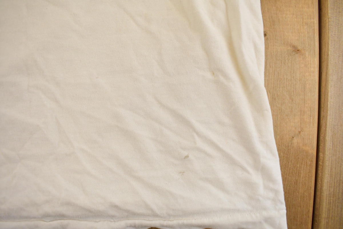 Vintage 1990s Garry Bjorklund Half Marathon Finisher Graphic T-Shirt Men's M from propervintagecanada