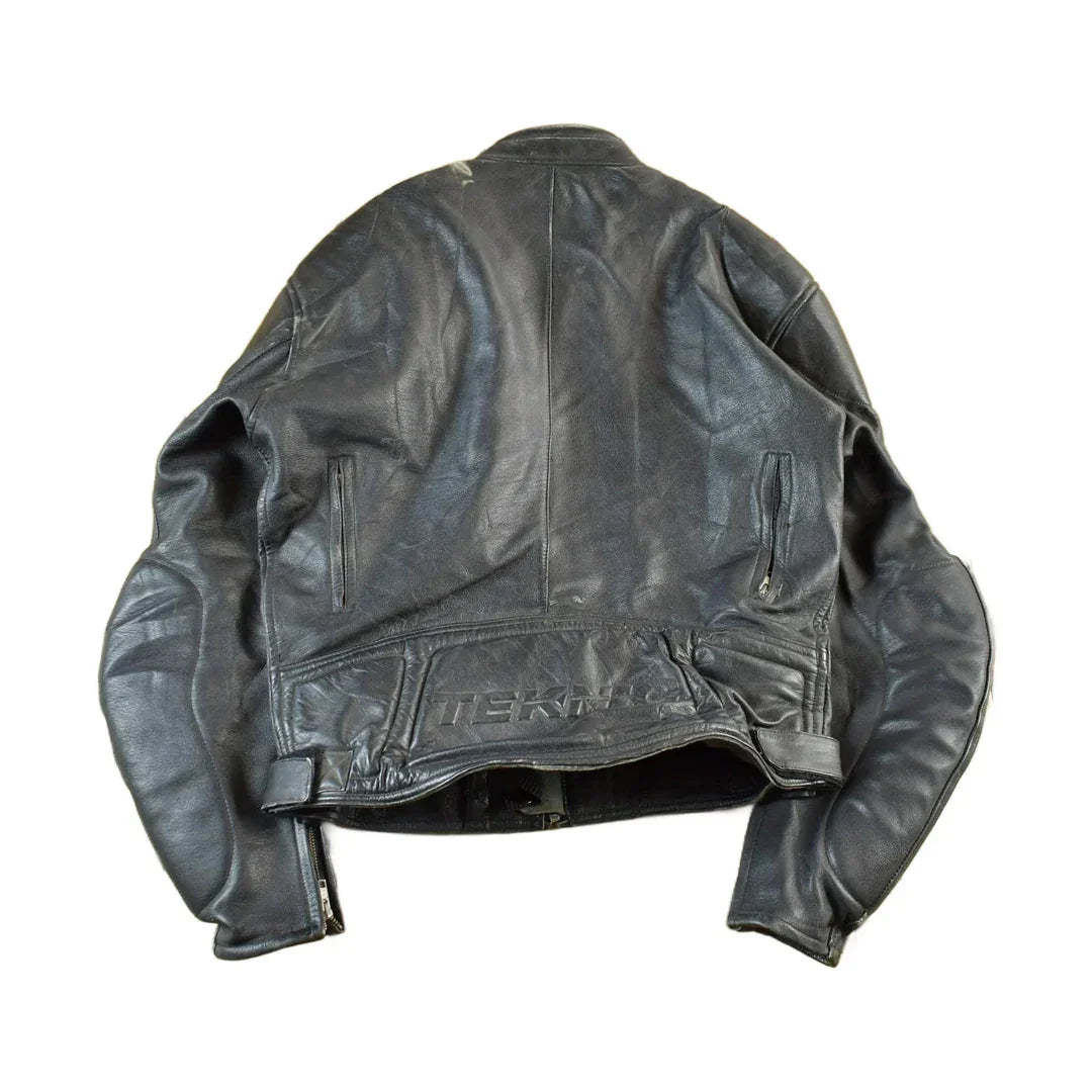 Vintage 1990s Genuine Leather Biker Jacket Padded Sleeve Adult Large Men's Medium from propervintagecanada