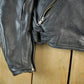 Vintage 1990s Genuine Leather Biker Jacket Padded Sleeve Adult Large Men's Medium from propervintagecanada