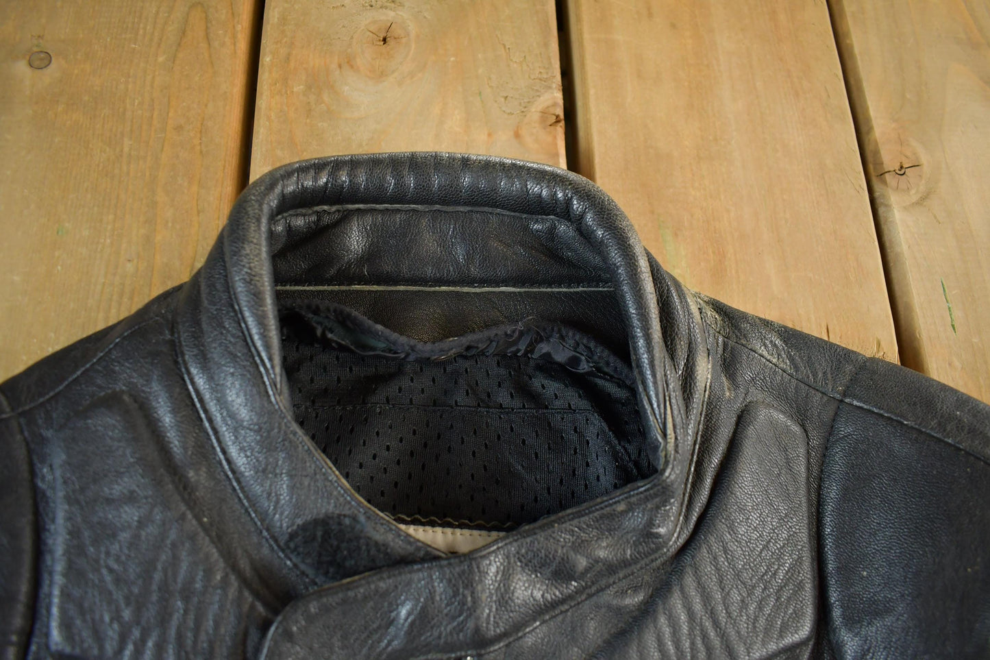 Vintage 1990s Genuine Leather Biker Jacket Padded Sleeve Adult Large Men's Medium from propervintagecanada