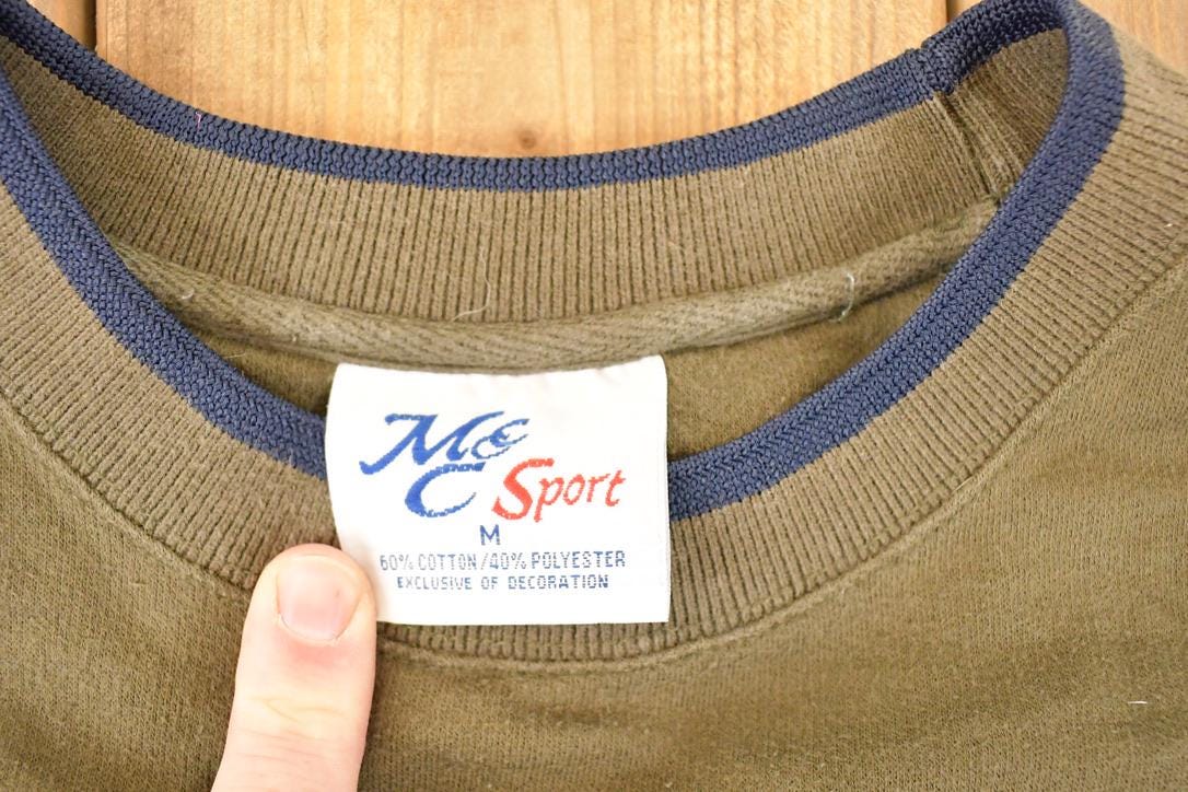Vintage 1990s Get A Grip Embroidered Golf Crewneck Sweatshirt Men's L from propervintagecanada