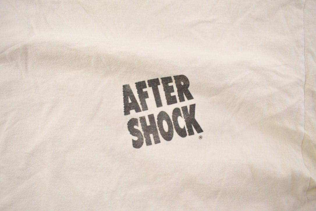 Vintage 1990s Get Shocked Graphic T Shirt Men's Medium from propervintagecanada