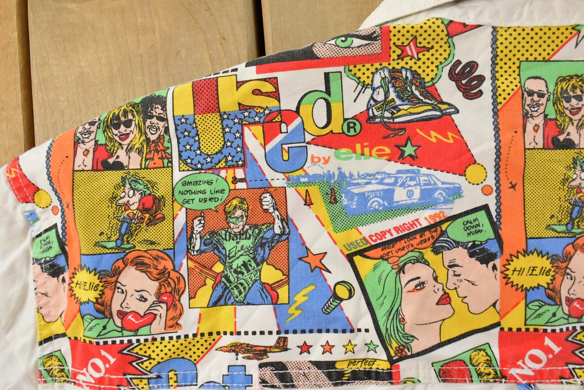 Vintage 1990s Get Used By Elie Pop Comic Art Button Up Shirt Men's L-XL from propervintagecanada
