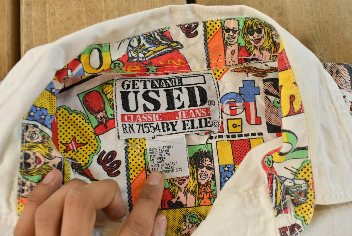 Vintage 1990s Get Used By Elie Pop Comic Art Button Up Shirt Men's L-XL from propervintagecanada