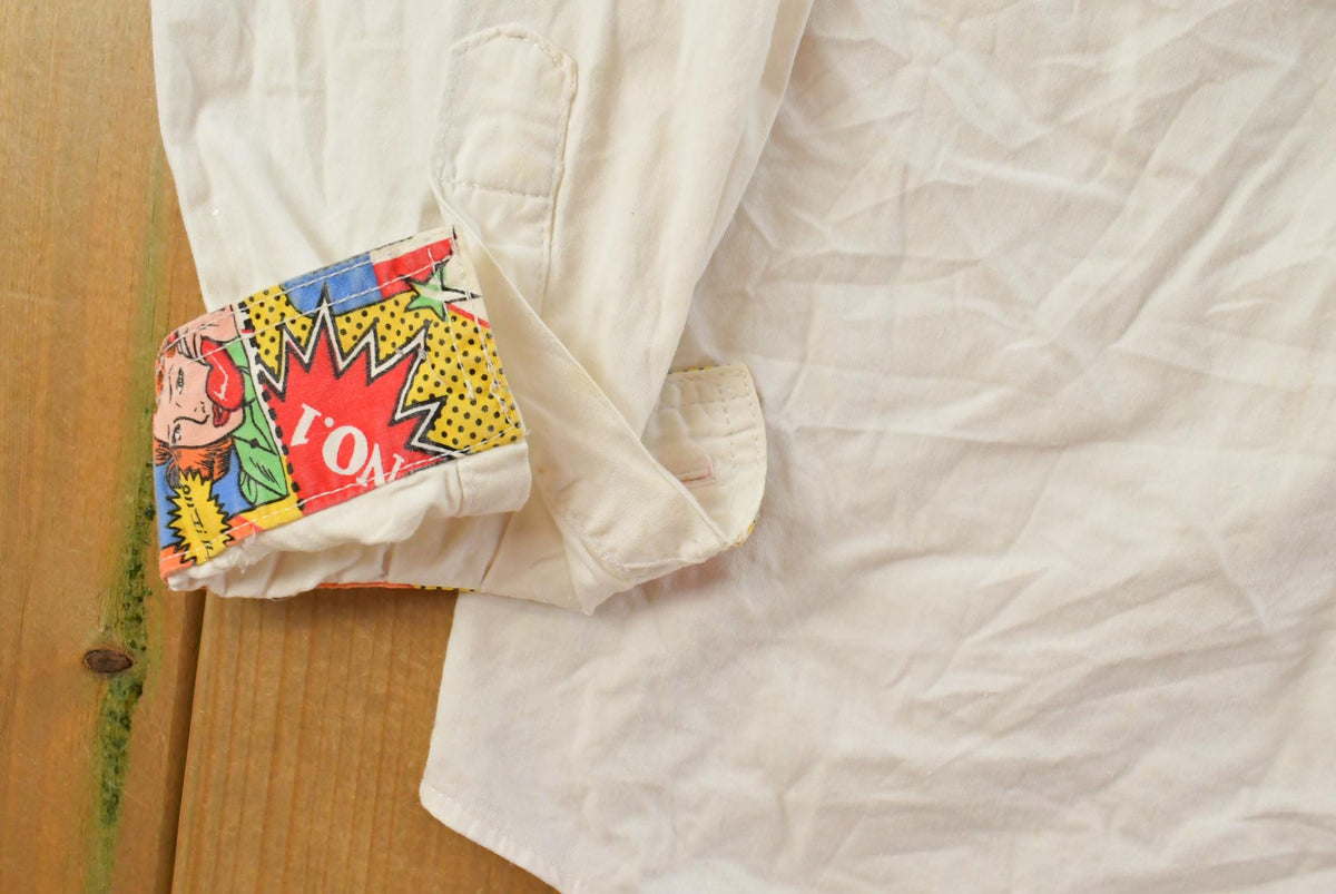 Vintage 1990s Get Used By Elie Pop Comic Art Button Up Shirt Men's L-XL from propervintagecanada
