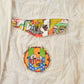Vintage 1990s Get Used By Elie Pop Comic Art Button Up Shirt Men's L-XL from propervintagecanada