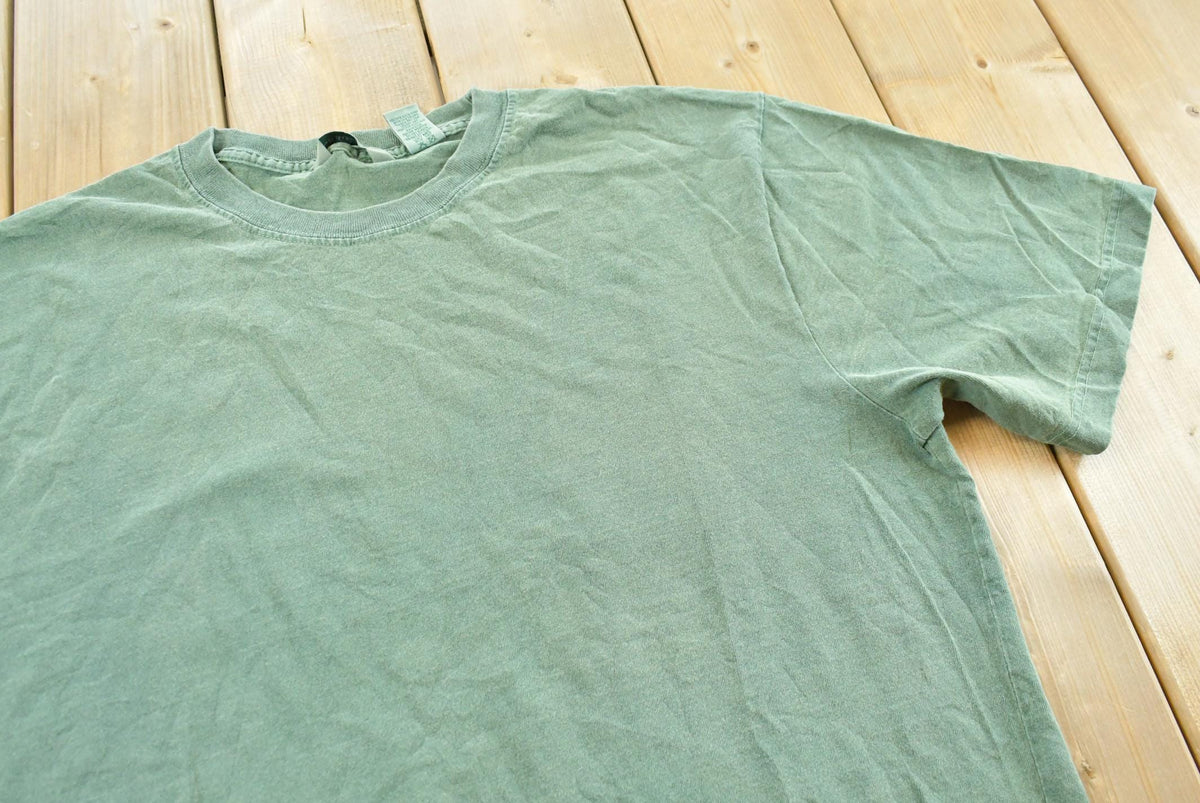Vintage 1990s GH Bass Co Blank Green T-Shirt Mens L from propervintagecanada