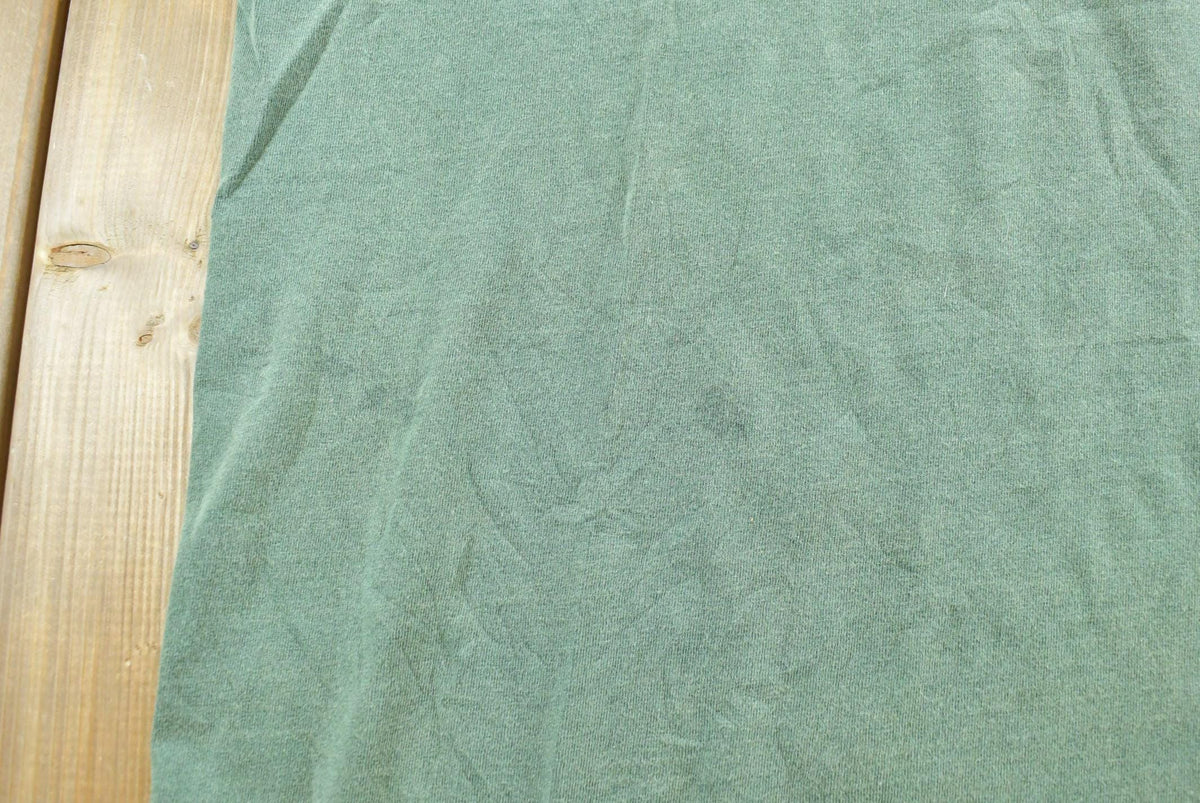 Vintage 1990s GH Bass Co Blank Green T-Shirt Mens L from propervintagecanada