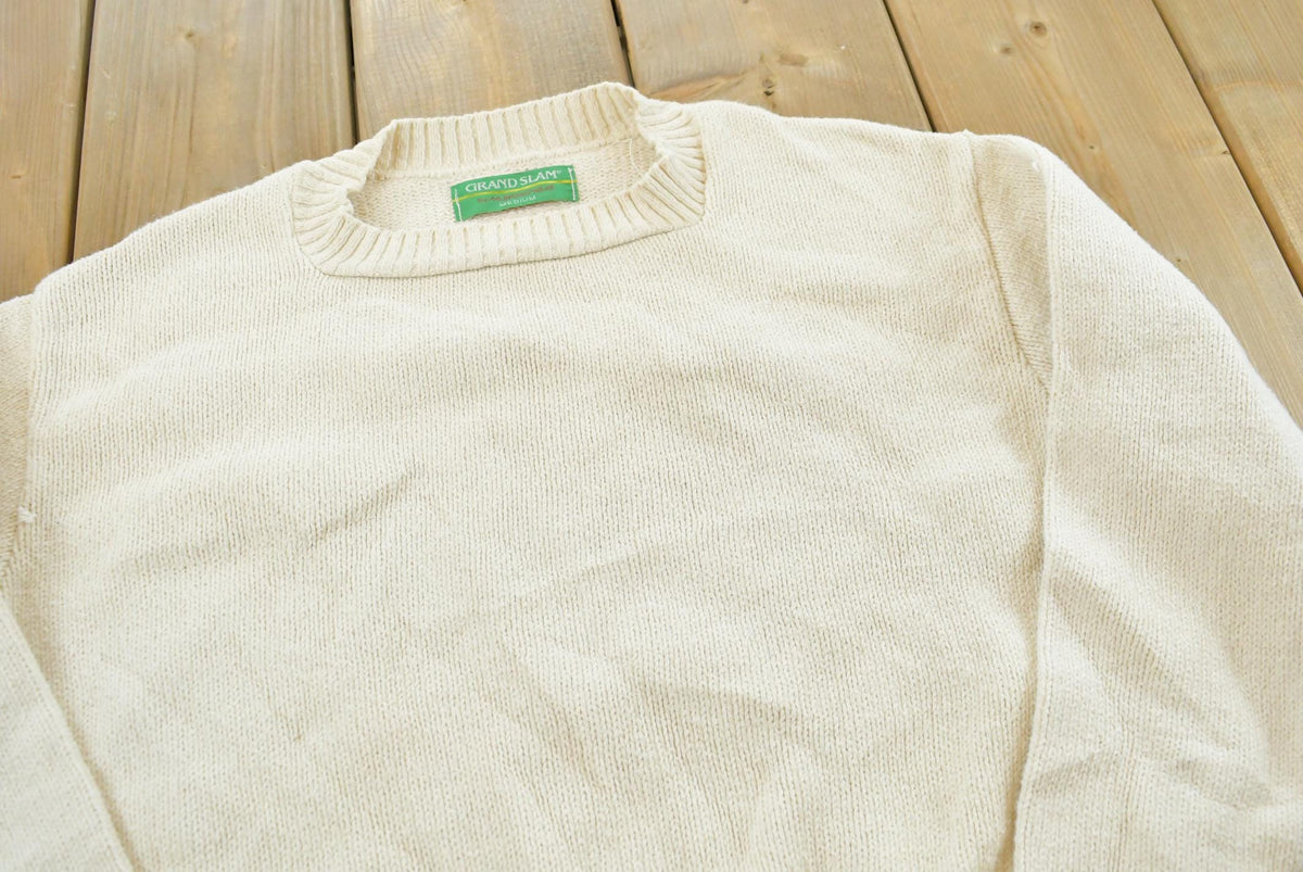 Vintage 1990s Grand Slam Munsingwear Knit Tennis Crewneck Sweater Mens M from propervintagecanada