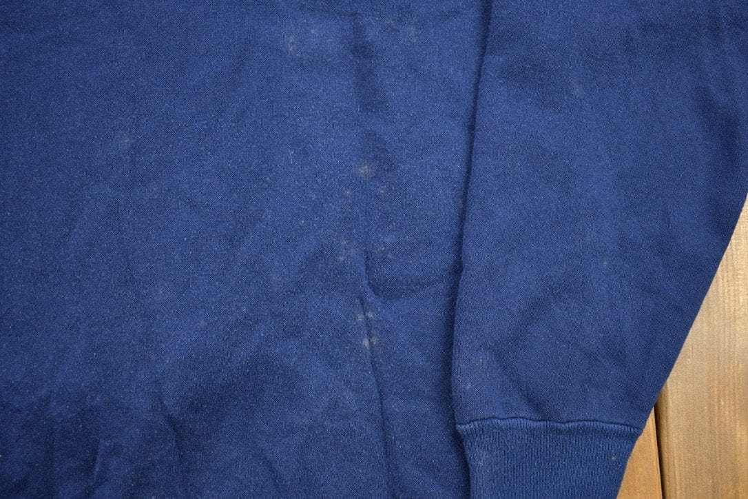 Vintage 1990s Graphic Crewneck Sweatshirt Men's Small from propervintagecanada